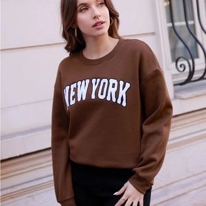 brown new york fuzzy crewneck sweatshirt